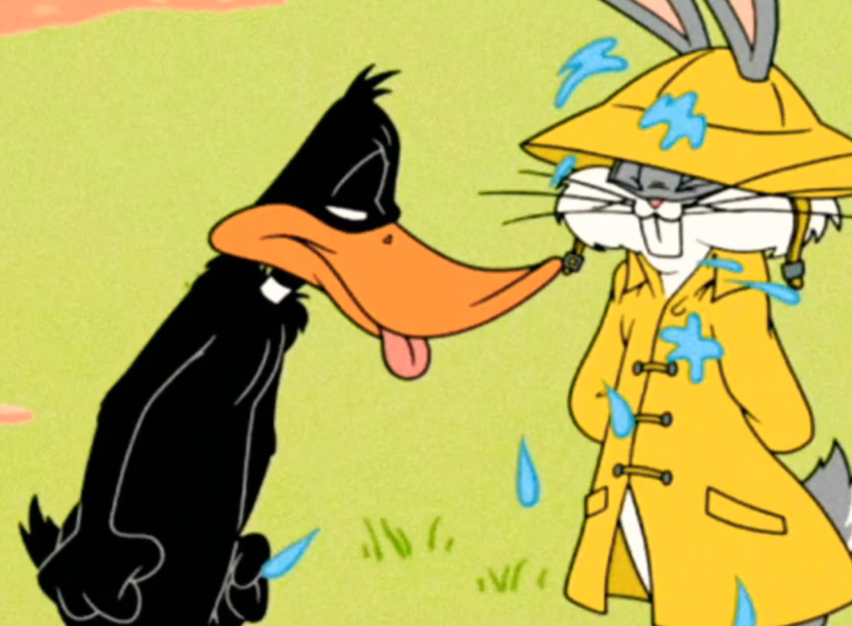 Sialoquent - one who spits as they talk